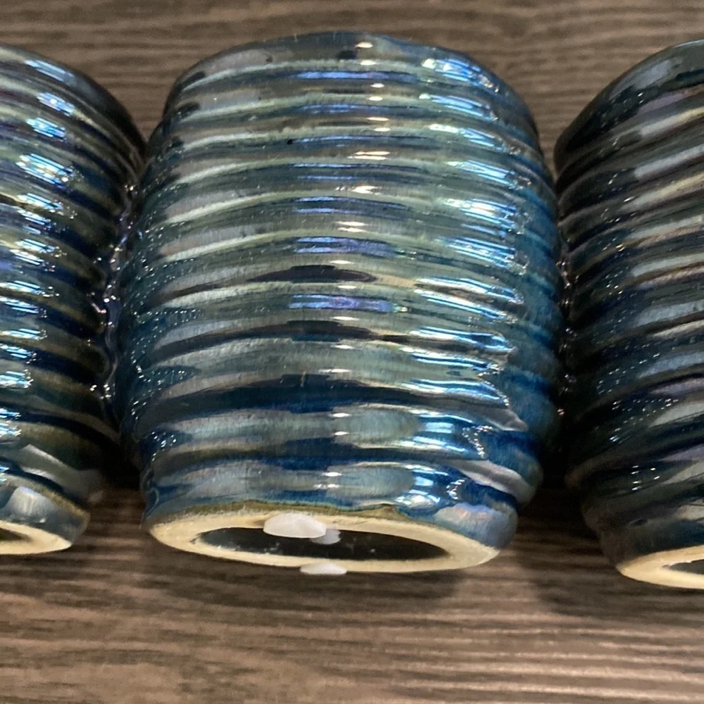 Decorative  clay, metallic blue container. 3 combined vases/cups.